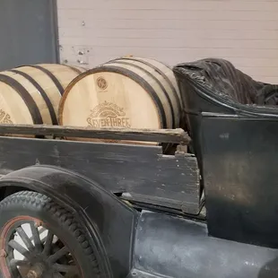 a truck loaded with barrels