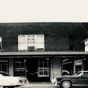 cars parked in front of a store