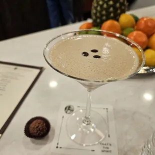 a glass of a cocktail