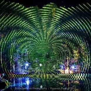 a circular tunnel in the middle of a lake