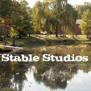 a pond with people sitting on it