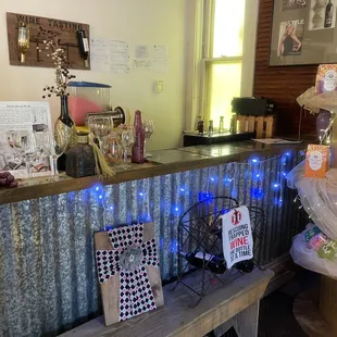 a bar with bottles of wine