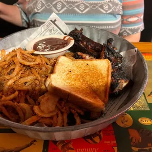 Blackened ends with onion rings and Texas toast.
