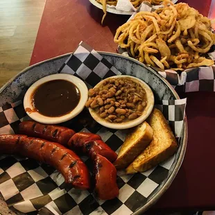 a plate of hot dogs and french fries