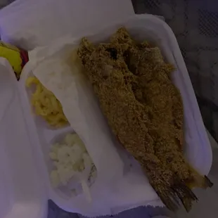 This is catfish , Mac and cheese , and mash potatoes