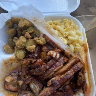a meal in a styrofoam container