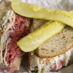 Roast Beef Sandwich: Rare Roast Beef, Swiss, Coleslaw, and Tiger sauce