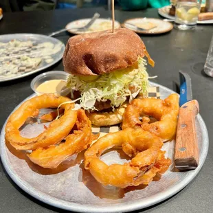 Their signature Stack 571 burger. Ask for blue cheese and onion rings instead of fries. It was juicy and delicious.