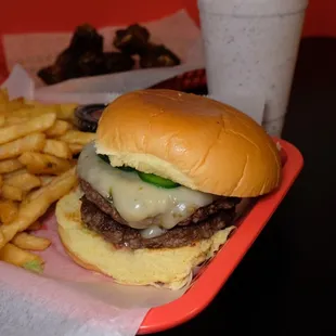 a plate of fries and a drink