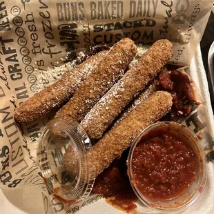 Cheese Stix with sauce spilled