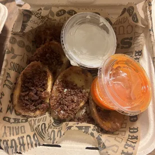 Buffalo Potato Skins with sauce on side
