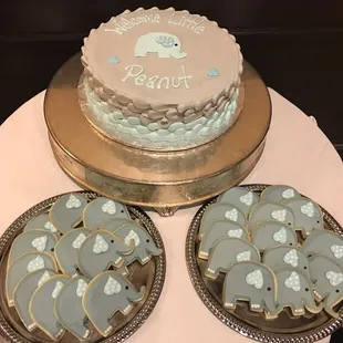a cake and cookies on a table