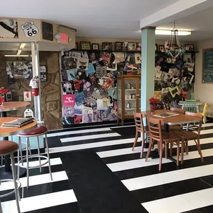 a black and white checkered floor in a restaurant
