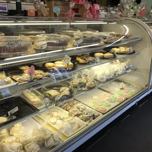 a display case filled with baked goods