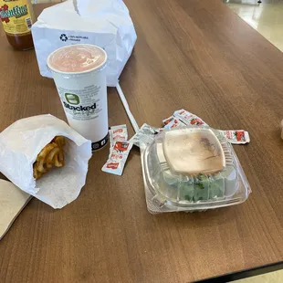 a sandwich and drink on a table