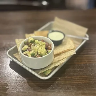 Ahi Poke: sushi grade ahi tuna, poke sauce, avocado, green/red onion, sesame seeds, side of wonton chips &amp; wasabi sauce | $16 (50% Off HH)