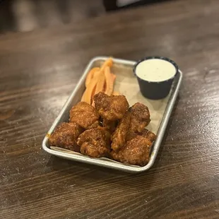 Chicken Wings: your choice of flavor served w/carrots &amp; ranch/blue cheese | $14.99 (50% off HH)