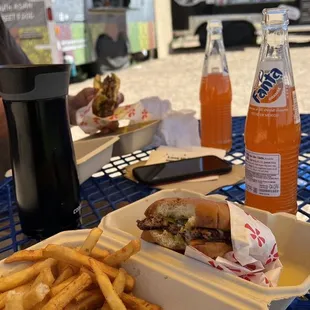 Stackers: Green Chili Cheeseburger, Fries and Soda.