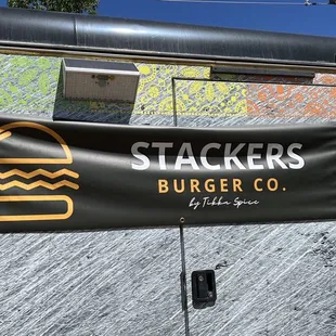 a sign for stackers burger co