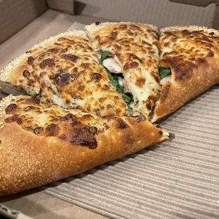 Calzone with fresh tomato, mushroom and spinach