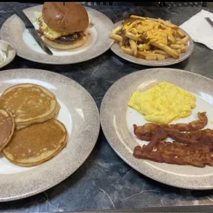 Buttermilk Pancakes, Bacon, and Eggs  Cheeseburger and Chili Cheese Fries