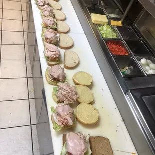 a long line of sandwiches