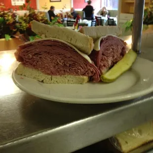Our classic corned beef sandwich served on rye with Swiss cheese!