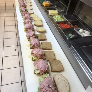 a long line of sandwiches