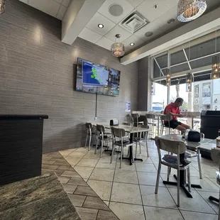 Very clean modern look with tiled walls. I love the rock on one wall.
