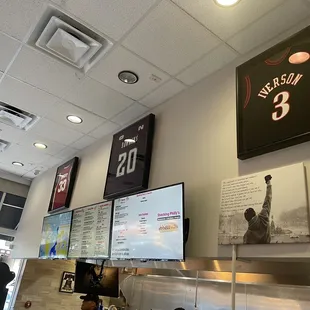 a wall of sports memorabilia