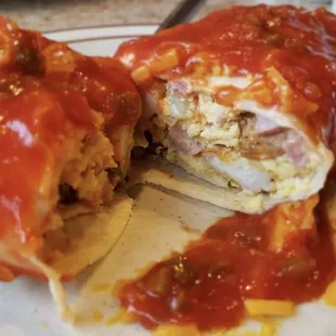 Our delicious angry burrito contains, Angry Potatoes, Chorizo, Scrambled Eggs, Pepper Jack, and is drizzled with our home made salsa.