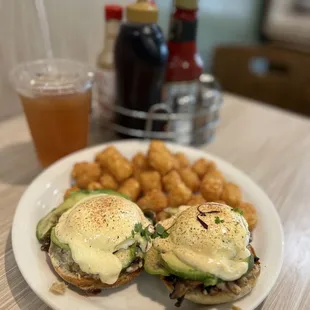 Crab and mushrooms benedict add avocado l, sub to tater tots
