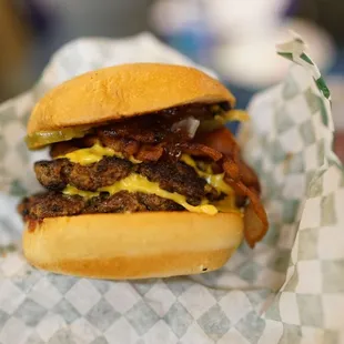 This burger was so good.  Note that it&apos;s a tall stack.  I had to squish the buns together to make this bite-able.