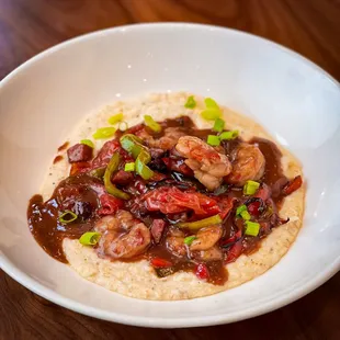 Low Country Shrimp &apos;N Grits - royal red shrimp, stone-ground grits, andouille sausage and beef jus
