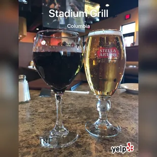 two glasses of beer on a table