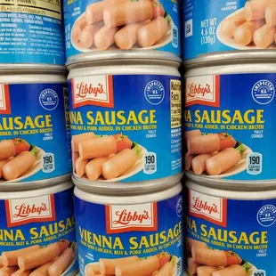 a stack of canned sausages