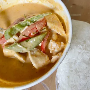 Amazingggggggg Thai Style House Panang Curry (the lime leaf is so good!) and a side of sticky rice (comes with normal white rice)