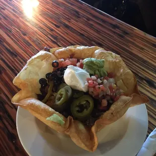 Taco salad! He couldn&apos;t even eat it all! But loved it! We usually order house raspberry hot wings. But wanted to go light.... lol