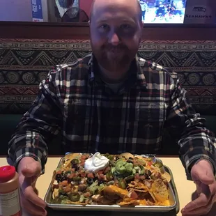 Regular nacho. Too much for one compadre.