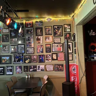 Wall of performers on display