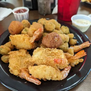 Shrimp basket with fried okra and hush puppies