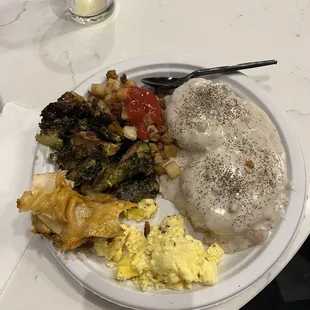 Buffet style breakfast with biscuits and gravy, Brussels sprouts and so many sides!