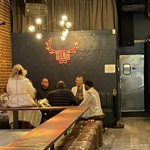 a group of people sitting at a table