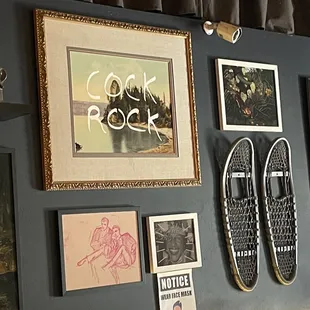 a collection of skateboards on a wall