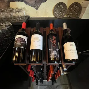 a display of wine bottles in a wine cellar