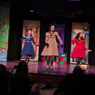 a group of children on stage