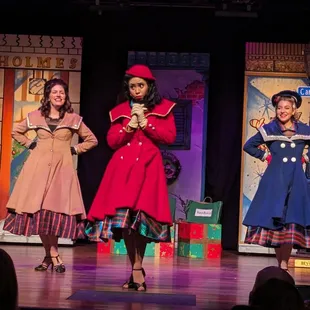 three women dressed in costumes