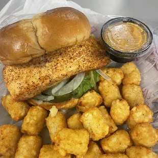 Salmon Sandwich with remoulade and tater tots