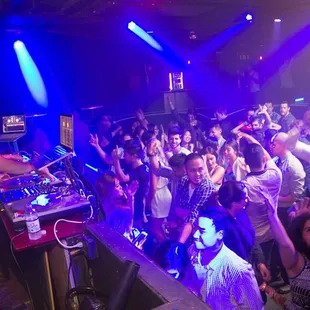 a crowd of people at a nightclub