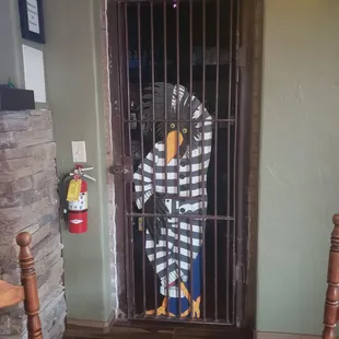 Saloon prisoner. I think he forgot to pay his bill.